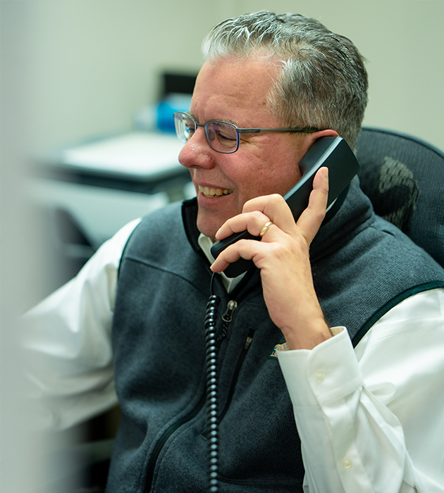 Senior couple hugging.